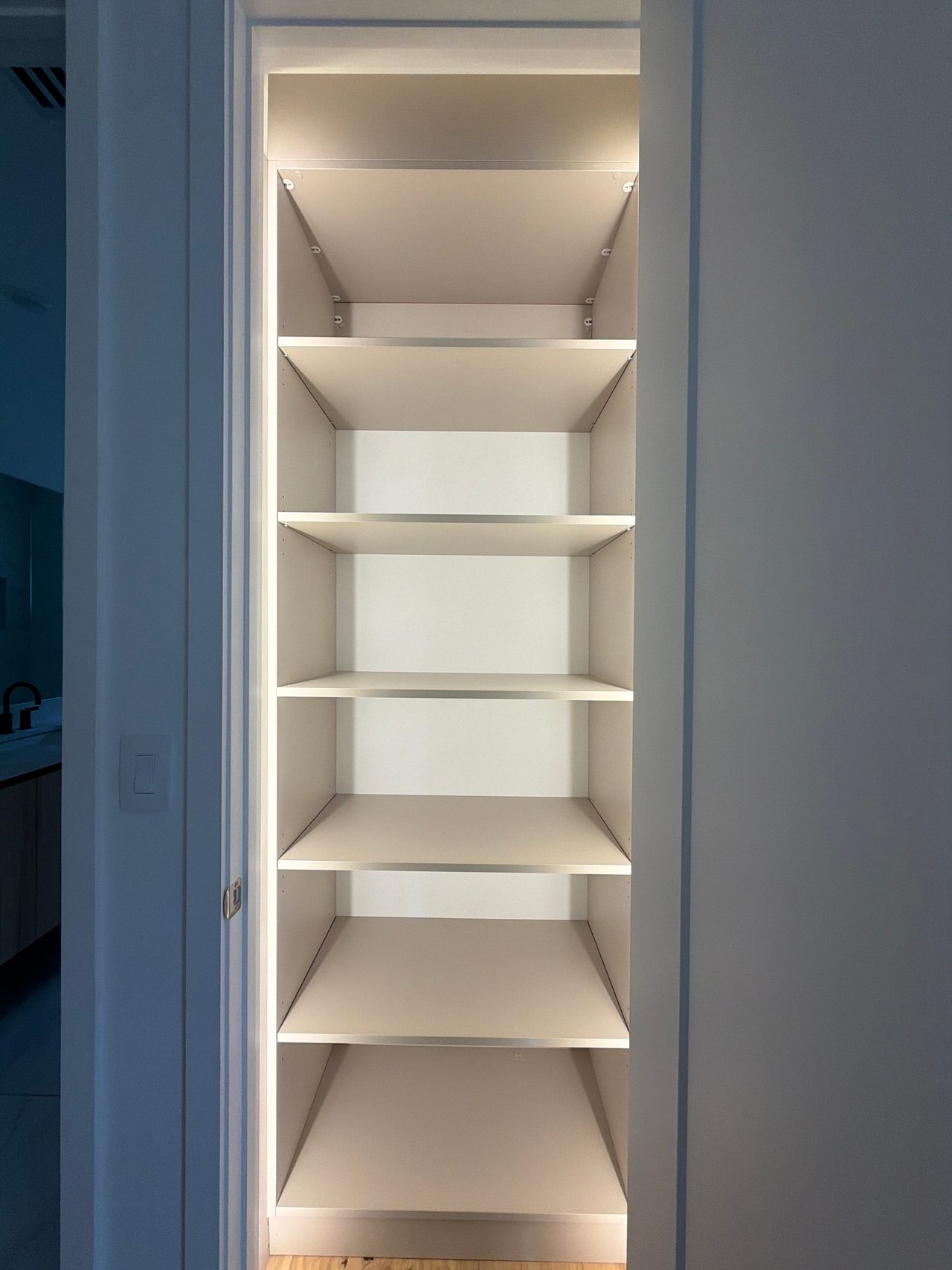 White built-in cubby compartments with integrated LED lighting