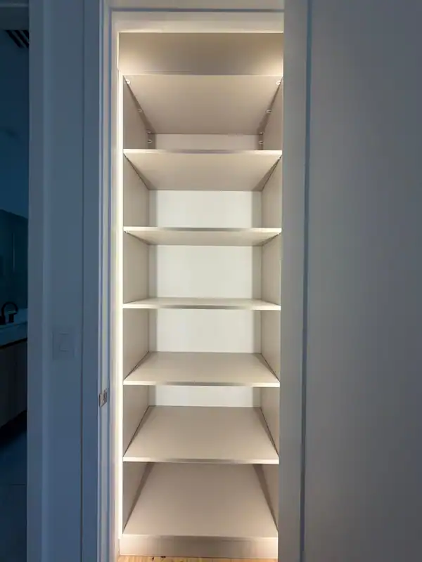 White built-in cubby compartments with integrated LED lighting